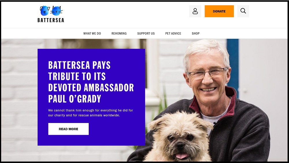 Screenshot of Battersea's homepage leading with a tribute to 'its devoted ambassador Paul O'Grady'